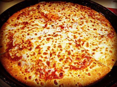 How does Pizza - Original Extra Cheese fit into your Daily Goals - calories, carbs, nutrition