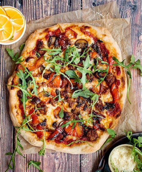 How does Pizza Sausage Mushroom fit into your Daily Goals - calories, carbs, nutrition