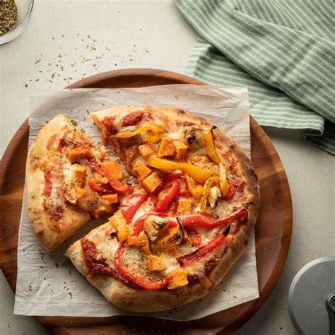 How does Pizza Snowshoe Roasted Veggie Cut 8 fit into your Daily Goals - calories, carbs, nutrition