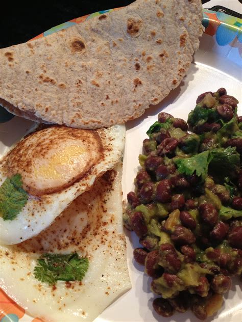 How does Pizzetta Whole Wheat Huevos Rancheros 1/2 EA fit into your Daily Goals - calories, carbs, nutrition