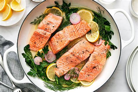 How does Poached Salmon w/Field Greens Jazz Salad fit into your Daily Goals - calories, carbs, nutrition