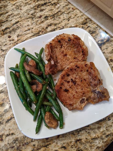 How does Pork Chop BNLS 4 oz Braised Rosemary & Garlic fit into your Daily Goals - calories, carbs, nutrition