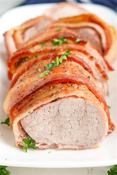 How does Pork Loin Bacon Wrapped 4 oz fit into your Daily Goals - calories, carbs, nutrition