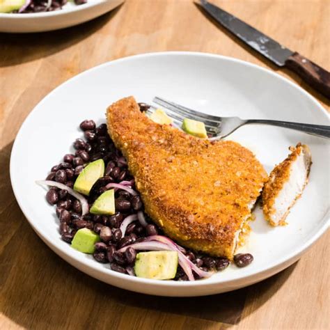 How does Pork Loin Roasted Fried Plantains Black Beans & Rice Chili Mojo fit into your Daily Goals - calories, carbs, nutrition