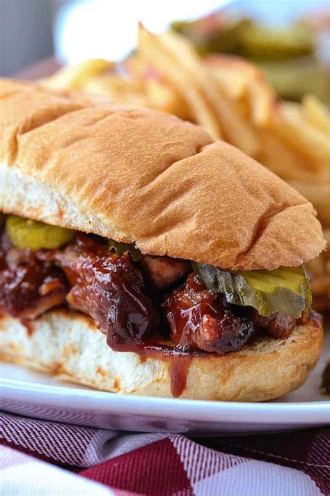 How does Pork Rib Sandwich fit into your Daily Goals - calories, carbs, nutrition