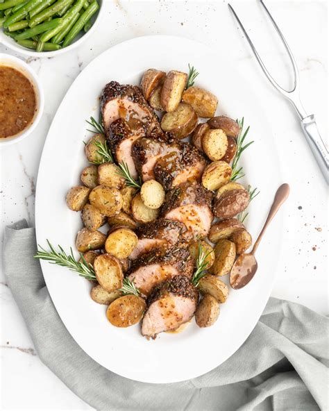 How does Pork Tenderloin with Peach Mustard fit into your Daily Goals - calories, carbs, nutrition