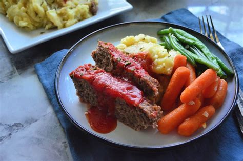 How does Portobello Meatloaf with Garlic Mashed Potatoes fit into your Daily Goals - calories, carbs, nutrition