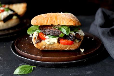 How does Portobello Sandwich with Wheat Bun fit into your Daily Goals - calories, carbs, nutrition