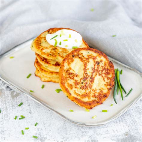 How does Potato Pancakes with Sour Cream and Honey Apricot Compote fit into your Daily Goals - calories, carbs, nutrition