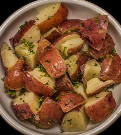 How does Potatoes Red B Steamed Parsley Quartered 4 oz fit into your Daily Goals - calories, carbs, nutrition