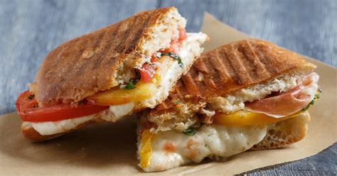 How does Prosciutto, Mozzarella, Basil and Tomato Panini fit into your Daily Goals - calories, carbs, nutrition