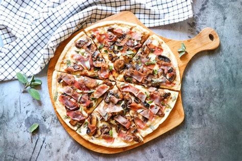 How does Prosciutto Mushroom Pizza (49498.12) fit into your Daily Goals - calories, carbs, nutrition