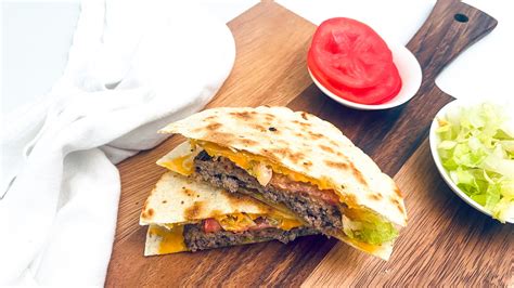 How does Quesadilla Burger fit into your Daily Goals - calories, carbs, nutrition