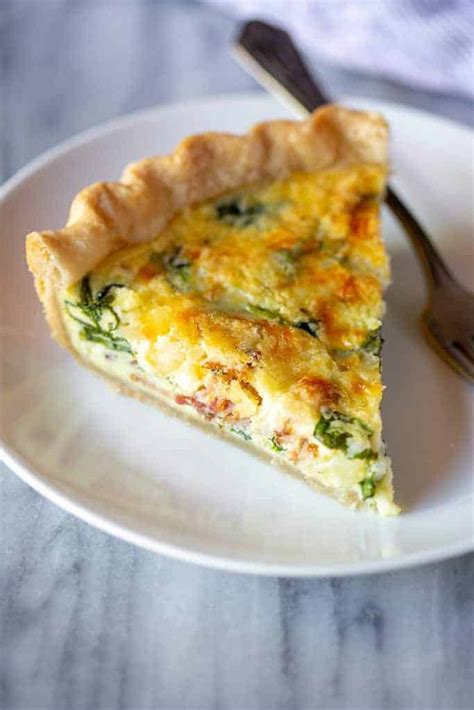 How does Quiche, Spinach Bacon & Swiss fit into your Daily Goals - calories, carbs, nutrition