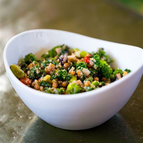 How does Quinoa Salad with Kale, Pine Nuts and Parmesan fit into your Daily Goals - calories, carbs, nutrition