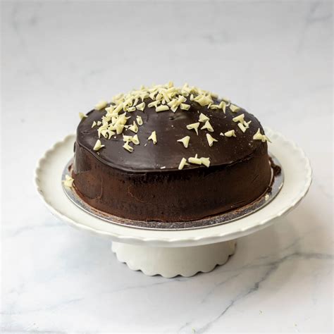 How does Rich Belgian Chocolate Fudge Cake fit into your Daily Goals - calories, carbs, nutrition