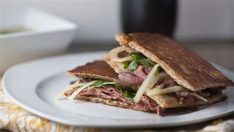 How does Roast Beef Panini with Caramelized Onion fit into your Daily Goals - calories, carbs, nutrition