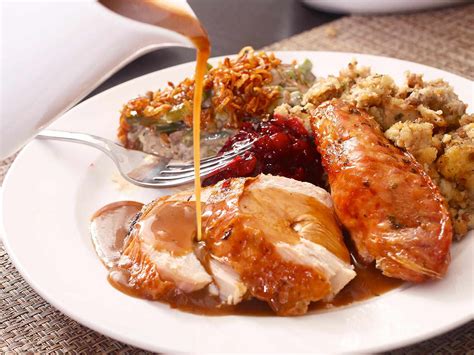 How does Roast Turkey Dinner with mashed potato, gravy,stuffing and vegetable fit into your Daily Goals - calories, carbs, nutrition