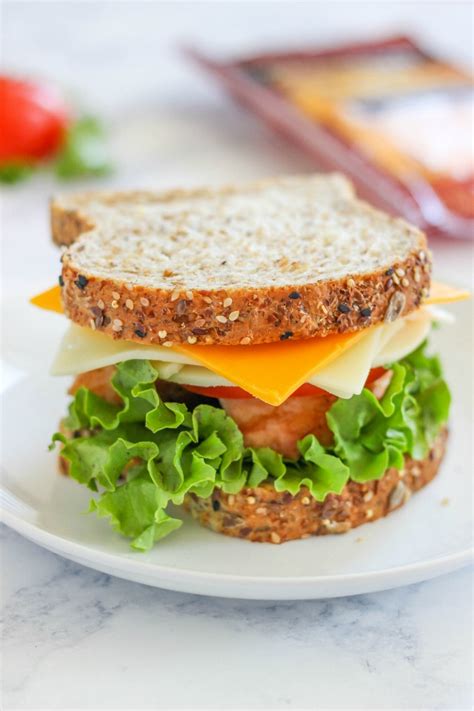 How does Roast Turkey and American Cheese Sandwich fit into your Daily Goals - calories, carbs, nutrition