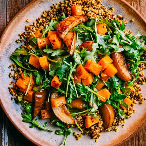 How does Roasted Turkey - Quinoa - Spinach Salad Acorn Squash fit into your Daily Goals - calories, carbs, nutrition