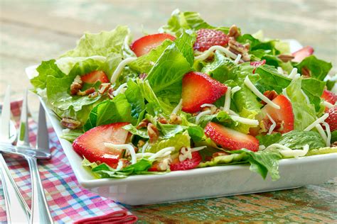 How does Romaine Salad with Strawberries, Almonds and Peas fit into your Daily Goals - calories, carbs, nutrition