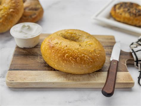 How does Rosemary Olive Oil Bagel fit into your Daily Goals - calories, carbs, nutrition