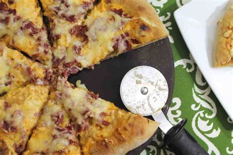 How does Rueben Pizza Wheat Crust fit into your Daily Goals - calories, carbs, nutrition