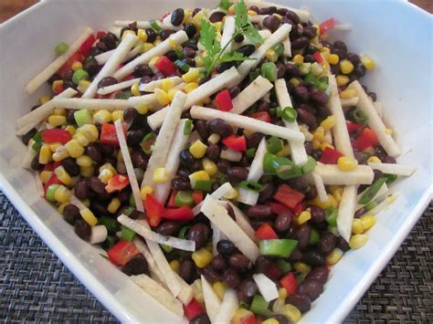 How does Salad Black Bean Corn Jicama & Vinaigrette 1 oz fit into your Daily Goals - calories, carbs, nutrition