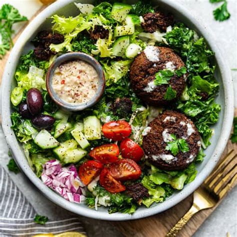 How does Salad Falafel 1/2 Cup fit into your Daily Goals - calories, carbs, nutrition