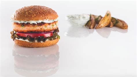 How does Salmon Burger Ellie Krieger Plate with Potato Wedges fit into your Daily Goals - calories, carbs, nutrition