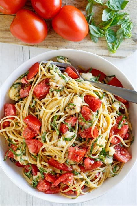 How does Salmon Florentine and Linguine Tossed with Garlic, Basil and Tomato and Mixed Vegetables fit into your Daily Goals - calories, carbs, nutrition