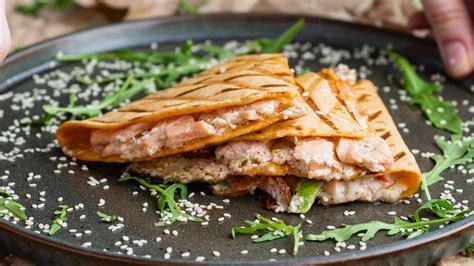 How does Salmon and Bean Quesadilla fit into your Daily Goals - calories, carbs, nutrition