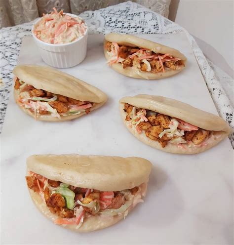 How does Sand Bao Tandoori Chicken 2 EA fit into your Daily Goals - calories, carbs, nutrition