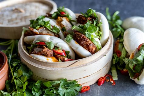 How does Sand Bao Thai Chicken 2 EA AAW fit into your Daily Goals - calories, carbs, nutrition