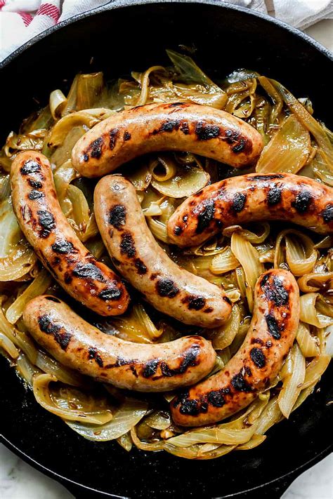 How does Sand Bratwurst Maple Cider Mustard Caramelized Onions fit into your Daily Goals - calories, carbs, nutrition