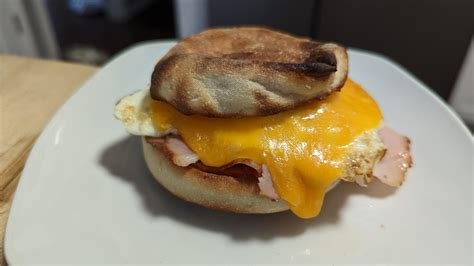 How does Sand Brkf English Muffin Ham Fried Egg & Cheese fit into your Daily Goals - calories, carbs, nutrition