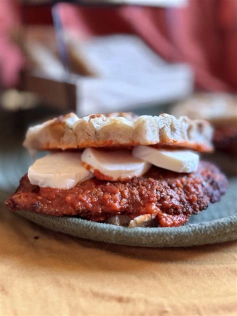 How does Sand Chicken Parmesan Focaccia fit into your Daily Goals - calories, carbs, nutrition