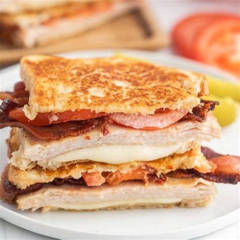 How does Sandwich, Turkey and Bacon Melt (Bostwick) fit into your Daily Goals - calories, carbs, nutrition