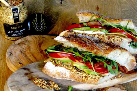 How does Sandwich Bar - Wholegrain Mustard fit into your Daily Goals - calories, carbs, nutrition