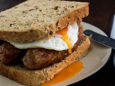 How does Sausage, Egg, and Cheese Breakfast Sandwich fit into your Daily Goals - calories, carbs, nutrition