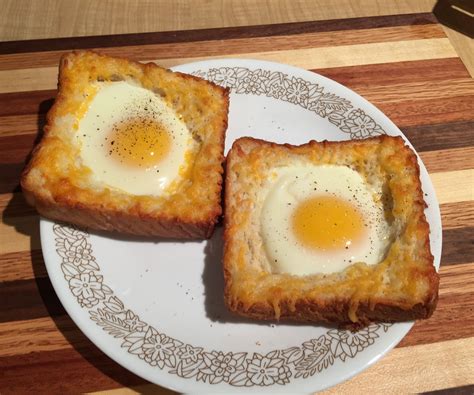 How does Sausage, Egg and Cheese on Wheat Toast fit into your Daily Goals - calories, carbs, nutrition