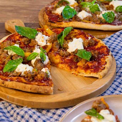How does Sausage, Fennel and Ricotta Pizza fit into your Daily Goals - calories, carbs, nutrition