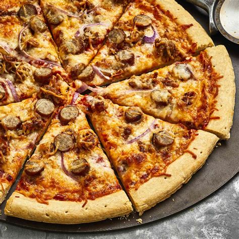 How does Sausage Cheese Pizza fit into your Daily Goals - calories, carbs, nutrition