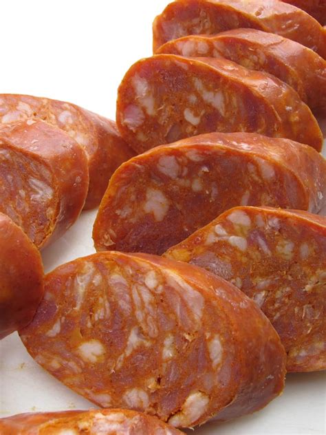 How does Sausage Portuguese Pre-Cooked Sliced 2 oz fit into your Daily Goals - calories, carbs, nutrition