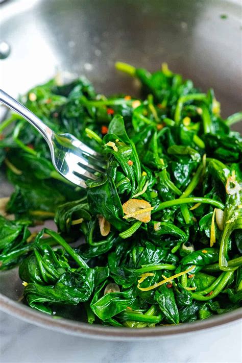 How does Sauteed Spinach w/Garlic & Pine fit into your Daily Goals - calories, carbs, nutrition