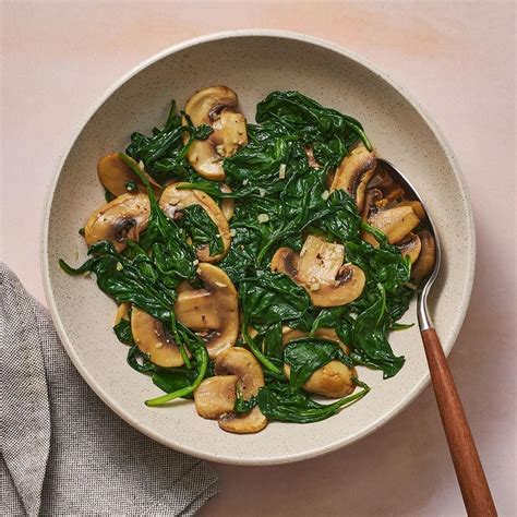 How does Sauteed Spinach with Mushrooms fit into your Daily Goals - calories, carbs, nutrition