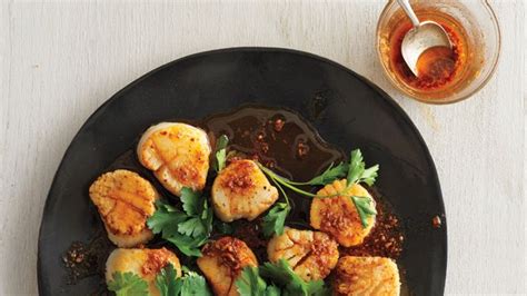 How does Scallops with Spice Oil fit into your Daily Goals - calories, carbs, nutrition