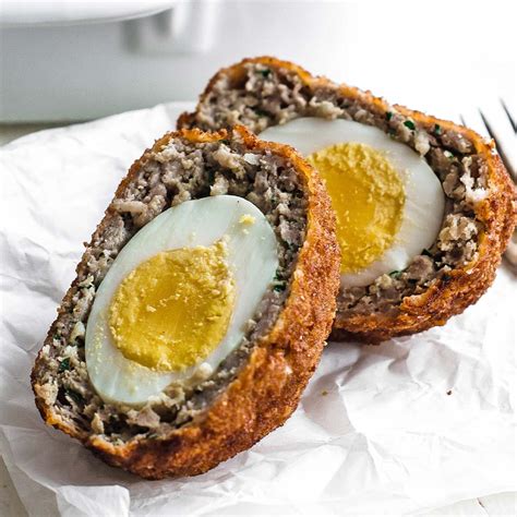 How does Scotch Egg with Baked Beans fit into your Daily Goals - calories, carbs, nutrition
