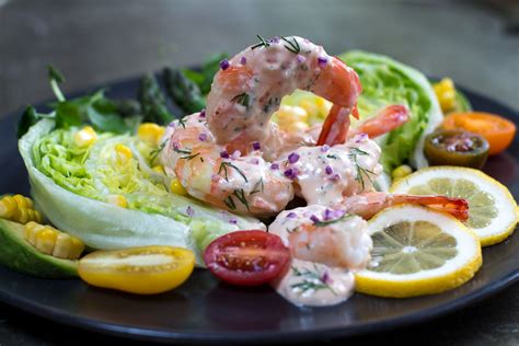 How does Seafood Louis Salad Plate fit into your Daily Goals - calories, carbs, nutrition