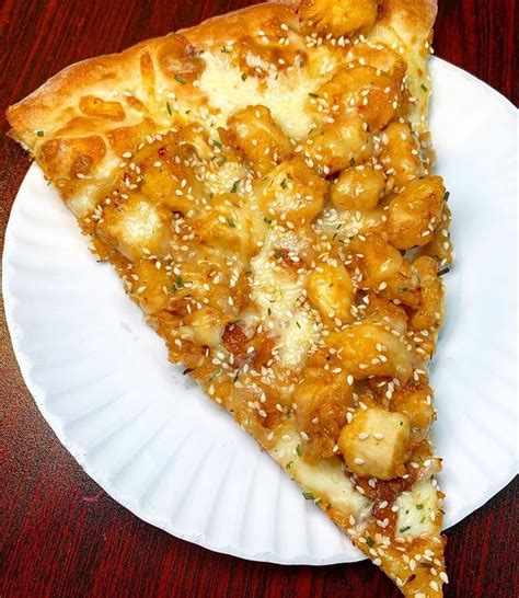 How does Sesame Chicken Pizza fit into your Daily Goals - calories, carbs, nutrition